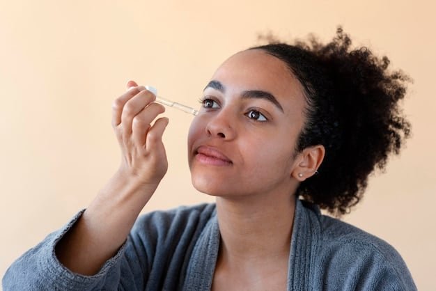 A person applying a serum to their face with a dropper, demonstrating targeted skincare treatment.