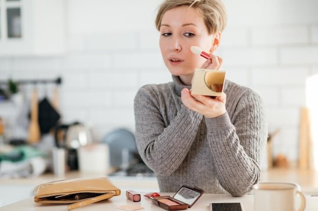 A woman applying moisturizer to her face, emphasizing the importance of hydrating the skin before applying foundation. The background shows a well-organized skincare station.