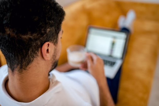 A detailed close-up of a person using a in a brightly lit café. The focus is on the screen and keyboard, capturing the user's interaction and the device's usability.